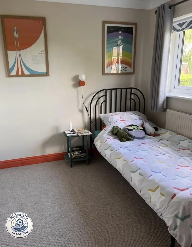 A freshly made guest bedroom